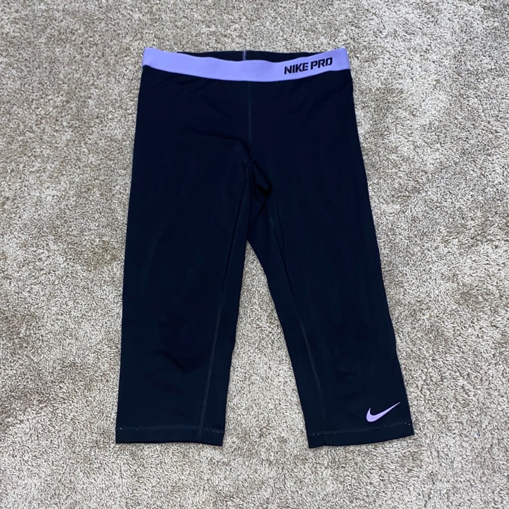 Purple and black Nike pro leggings
